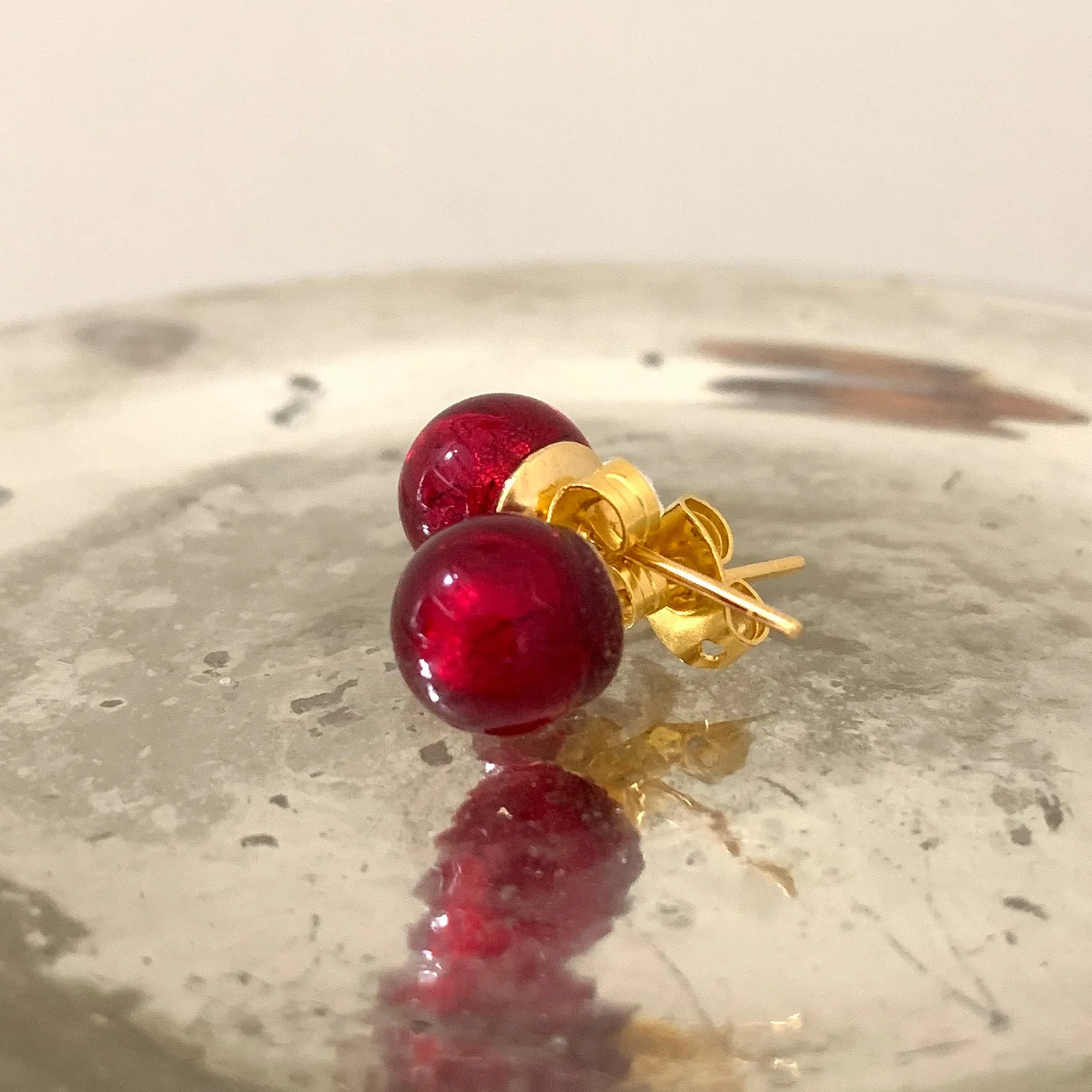 Earrings with red Murano glass sphere studs on 24ct gold plated posts